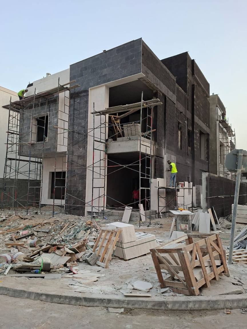 Villa exterior stone cladding and structural finishing